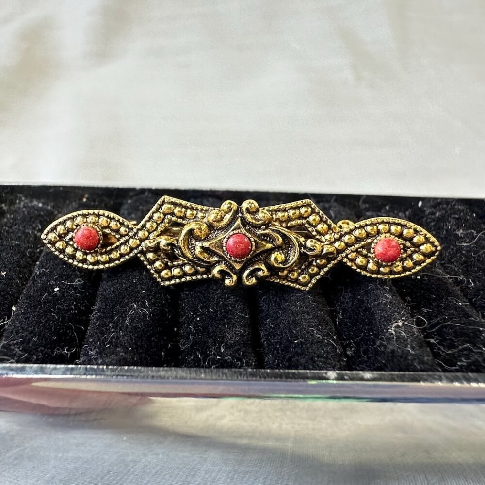 Vintage Gold Tone Fancy Brooch with Red Cabochons